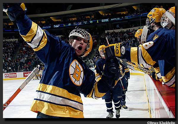 Photo of jubilation at Minnesota State Hockey Tournament by Breck player