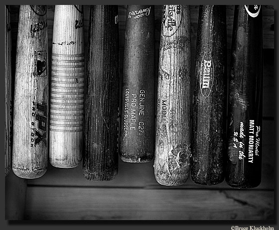 photo of amatuer baseball in rural Minnesota.  Bruce Kluckhohn, is a Minneapolis photographer who shoots photos of people on location in Minneapolis,Minnesota, the Midwest, and around the U.S. for editorial use in magazines and for corporate use in annual reports, newsletters, brochures, and the like.  With a creative eye, a strong design sense, his photo images, whether black and white or color photography, assignment or stock photography, communicate ideas with the reader.